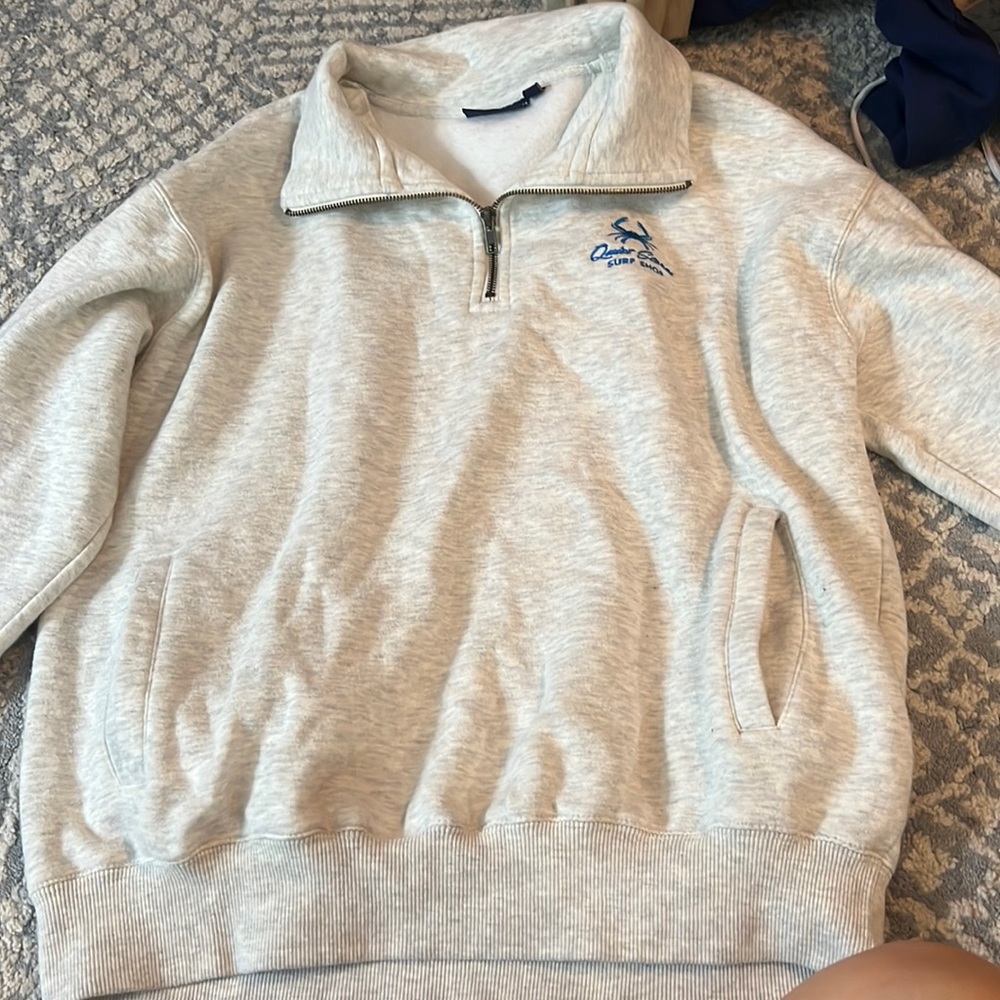 grey and white quarter zip